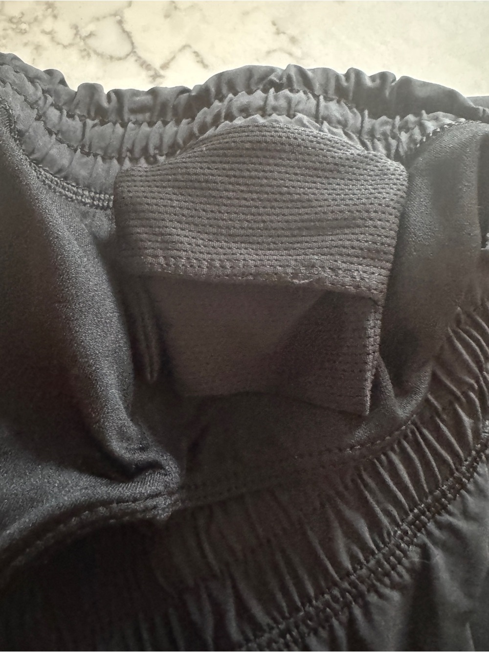 Athleta Racer Run Shorts 4 in Black
size large - Picture 4 of 10